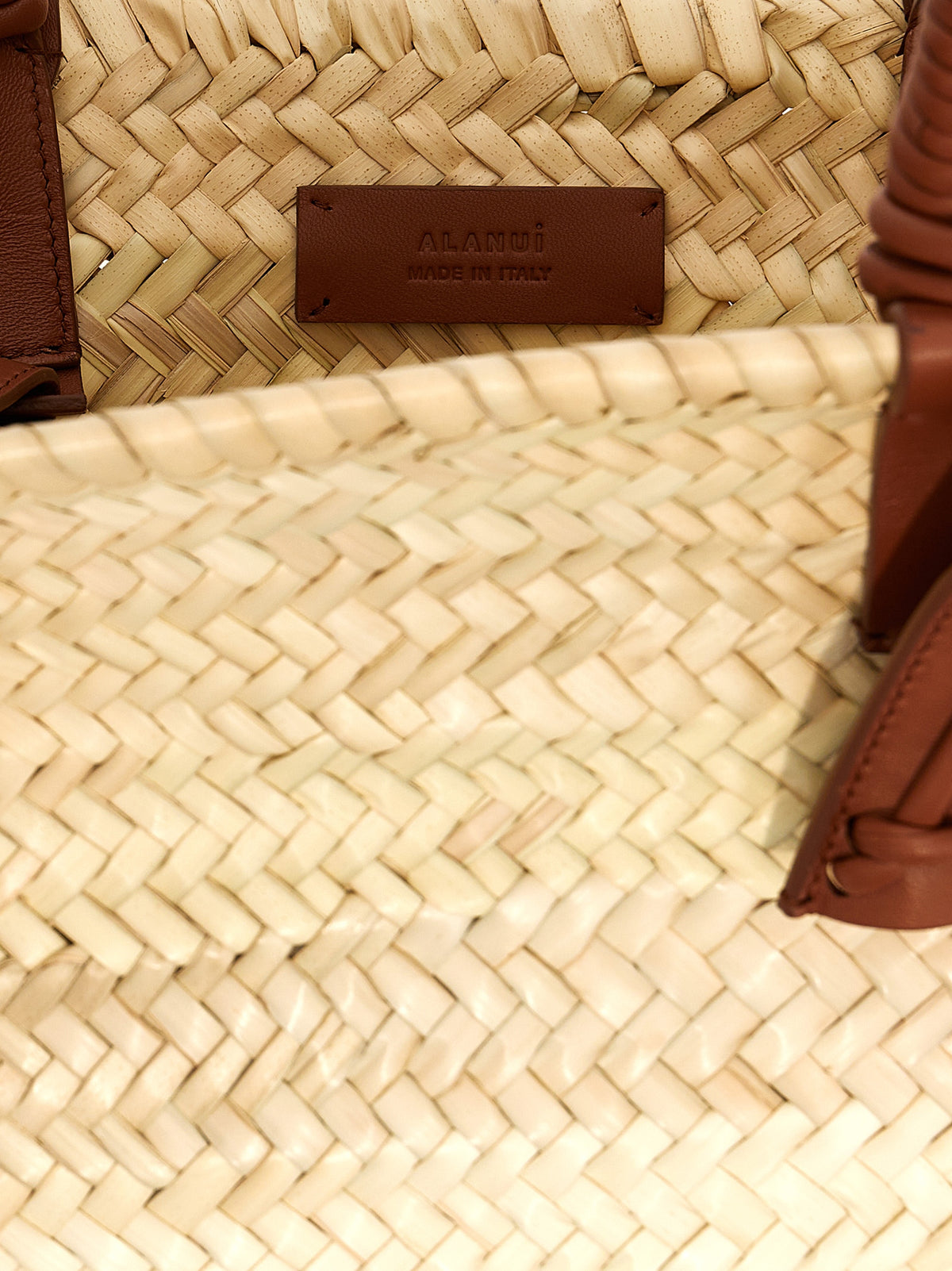 Alanui bohemian spirit with the ‘Icon Palm Leaf Small’ handbag